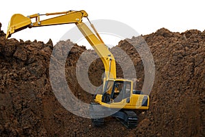 Excavator loader is digging in the construction site work.