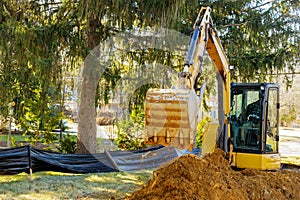 Excavator loader at earth moving construction works