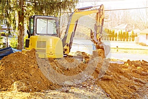 Excavator loader at earth moving works