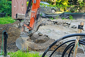 Excavator loader at earth moving works