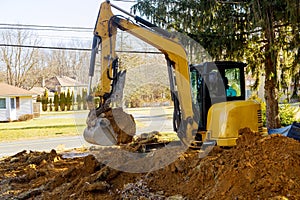Excavator loader at earth moving works