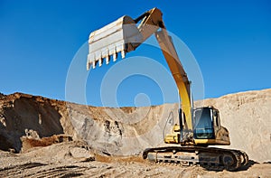 Excavator loader at earthmoving works