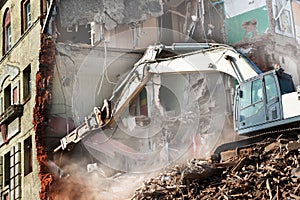 Excavator loader machine at demolition construction site