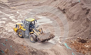 excavator loader machine during earthmoving works