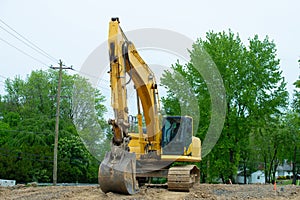 excavator loader machine during earthmoving works outdoors
