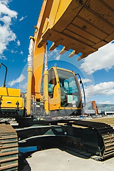 Excavator Loader Machine. Side View of Front Hoe Loader. Industrial Vehicle. Heavy Equipment Machine. Pneumatic Truck. Constructio