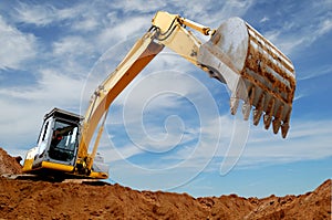 Excavator loader in sandpit