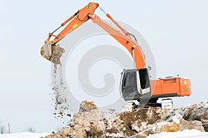 Excavator loader at winter works
