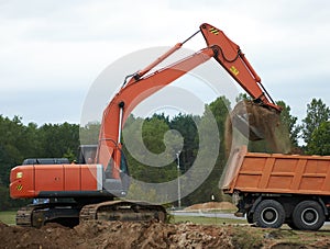 Excavator Loading Dumper Truck