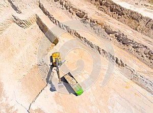 Excavator loading a truck.