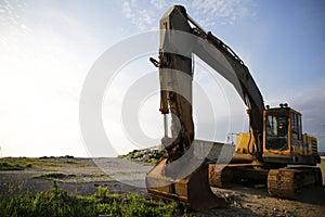 Excavator machine with crawler and wheels