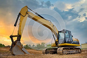 Excavator. A machine for earthworks. Construction site. Excavator for construction