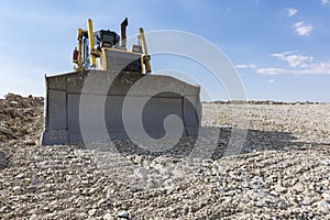 Excavator machine in the road construction works