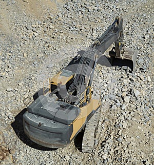 Excavator machine in Stone Quarry