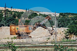 Excavator machine work and dig the sand