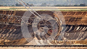 Excavator Mining In A Brown Coal Open Pit Mine.