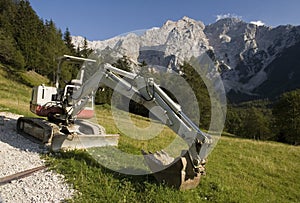 Excavator in the mountains