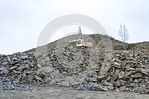 Excavator in an open pit mine