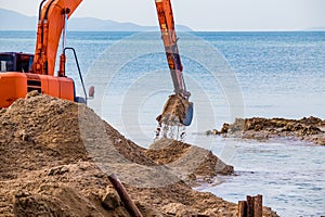 Excavator on the reclamation