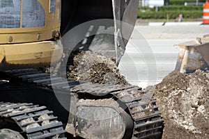 Excavator beside a roadway