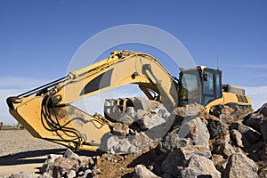 Excavator with rocks