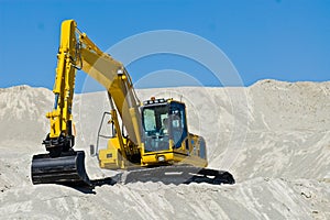 Excavator in sand