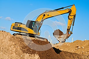 excavator at sandpit during earthmoving works