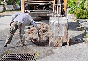 Excavator scoop digging, Repair of pipe water