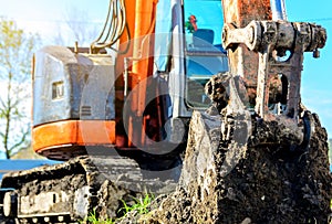 Excavator stand in construction site