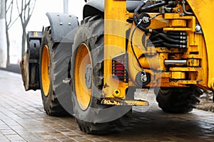 Excavator standing at pavement ready to work