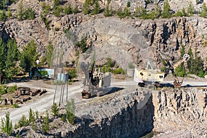 Excavator in a stone quarry for the extraction of crushed stone and gravel for use in construction