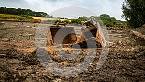 excavator tool on the ground at construction