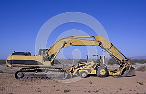 Excavator and tractor