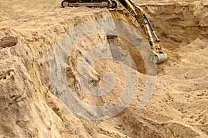 Excavator trenching.