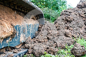 Excavator work with claying soil