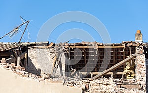 Excavator at work on demolition site