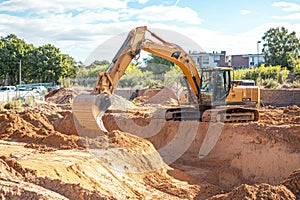Excavator on a Construction Site Digging Earth