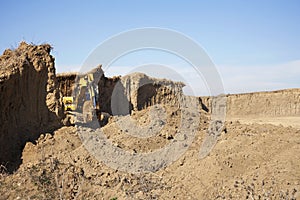 Excavator working on the excavation