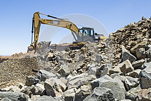 Excavator working in a mine.