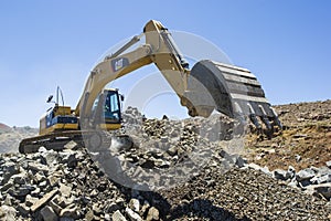 Excavator working in a mine.