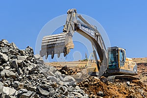 Excavator working in a mine.