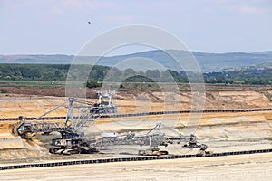 Excavator working on mine