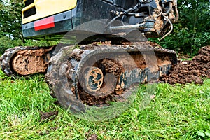 Excavator works on countryside