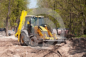 Excavator works with the earth