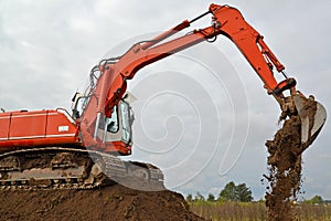 The excavator works at soil movement
