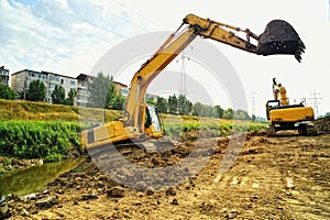 Excavators cleaning the riverbed