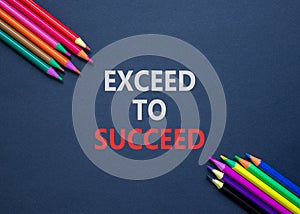 Exceed to succeed symbol. Concept words Exceed to succeed on beautiful black paper. Beautiful black table black background.