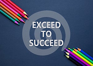 Exceed to succeed symbol. Concept words Exceed to succeed on beautiful black paper. Beautiful black table black background.