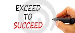 Exceed to succeed symbol. Concept words Exceed to succeed on beautiful white paper. Beautiful white table white background.