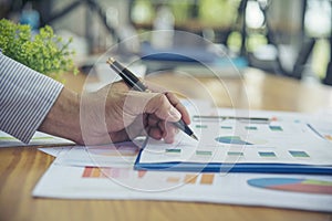 Excel stat spreadsheet business analytics graph statistic with graph and table data number in charts database. Accountant hands
